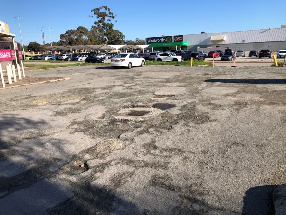 old damaged car park