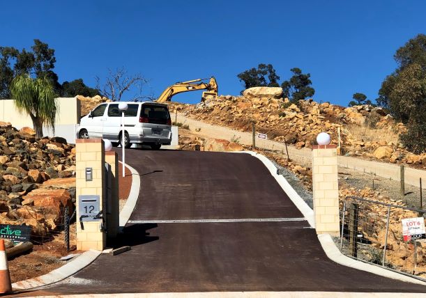 hot mix asphalt driveway entrance